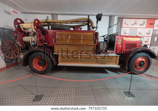 Salamanca, Spain - December 29 2017 : Historic,\
fire truck in museum of the histrory of automotion , in Salamanca ,\
Spain. It´s the first opened museum didicated to the history of\
automotion in Spain.