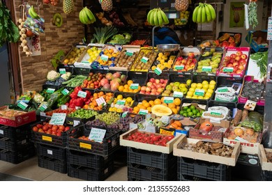 Salamanca, Spain - November 6 2022 - Interior Of The Food Market With Market Vendor Selling Fresh Fruit And Vegetables