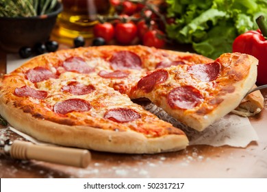 Salami Pizza Lifted 1 Slice