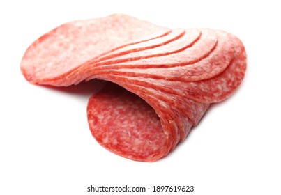 Salami slices for sandwich isolated on white background, round fermented red meat pieces