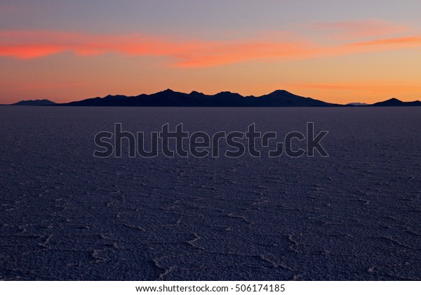 Salar de Uyuni, salt lake,\
is largest salt flat in the world, altiplano, Bolivia, South\
America, sunset
