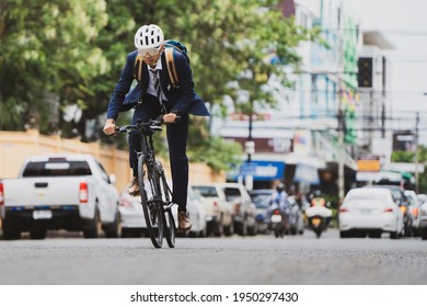 Salary Workers Are Cycling In The City To Work At Rush Hour.