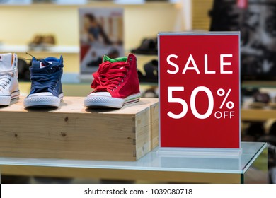 Sale 50% Off Mock Up Advertise Display Frame Setting Over The Men Shoes Shelf In The Shopping Department Store For Shopping, Business Fashion And Advertisement Concept