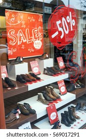 Sale And Discount In Display Window Of Shoe Store