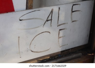 Sale Ice Sign In New York City Bodega Storefront Window During June Heat Wave