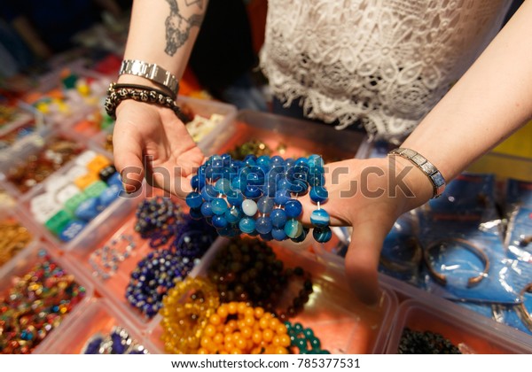 Sale of\
jewelry, beads, rings at the Indian\
Fair