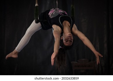 SALE, MOROCCO - SEPTEMBER 20, 2016: Moroccan Acrobat Nadia El Mrabti Trains On A Trapeze At The Moroccan National Circus School, Morocco's First Contemporary Circus School.