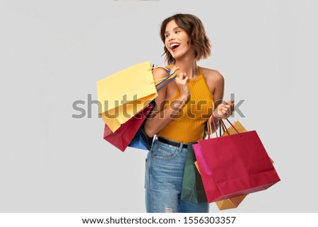 Similar – Yellow shopping bags on a blue background, Shopping concept