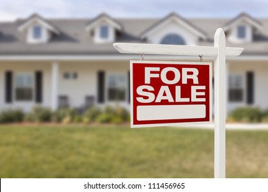 For Sale Real Estate Sign in Front of Beautiful New Home. - Shutterstock ID 111456965