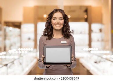 Sale, Shopping And Business Concept - Happy Female Shop Assistant With Tablet Pc Computer Name Tag Over Jewelry Store Background