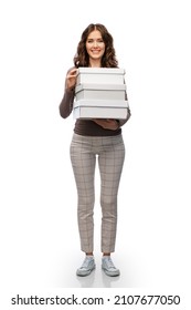 Sale, Shopping And Business Concept - Happy Female Shop Assistant Or Saleswoman Holding Three Shoe Boxes White Background