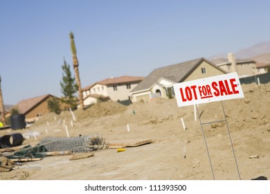 Lot For Sale Sign At An Empty Land