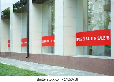 Sale Sign On Glass Window Shop