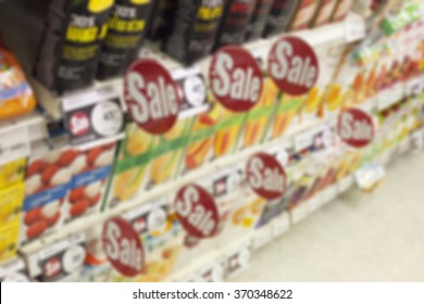 Sale Sign On Shelf  In Supermarket 