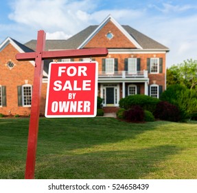 For Sale And Under Contract Realtor Sign In Front Of Large Brick Single Family House In Expansive Grass Yard For Real Estate Opportunity