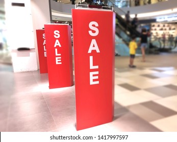 Sale Word Banner On The Shopping Mall Security Gates Scanner. 