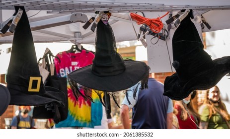 Salem, MA, US-October 14, 2021: Witches hats for sale during the annual Haunted Happenings event held in October in celebration of the town's history of witch trials and of Halloween. 