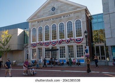 Salem, MA, US-October 14, 2021: People walk past the Peabody Essex Museum during the annual Haunted Happenings event held in October in celebration of the town's history of witch trials. 
