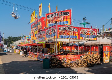 Salem, Oregon - September 8, 2022: Colorful State Faire Food Booths With Fried And Barbequed Food.