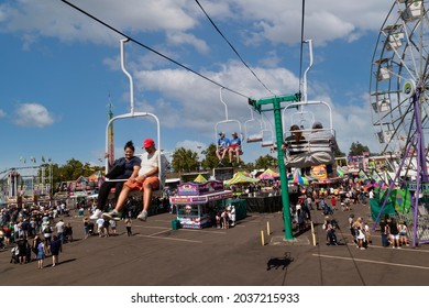 Salem, Oregon USA - August 28, 2021: An Elevated View From The Chairlifts, Of The Food Concessions And Amusement Rides At The Oregon State Fair