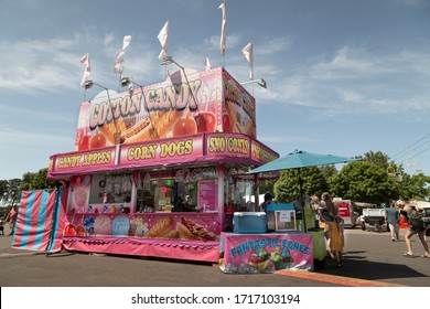 Salem, Oregon / USA - July 12, 2019:  A featured, angular point of view of the Cotton Candy food concession during the day - county fair
