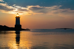 Salem Sunlight Passing Through Lighthouse At Dawn