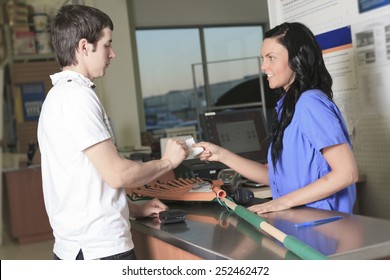 A Sales Assistant Portrait In Home Appliance Shop Supermarket Store