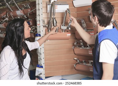 A Sales Assistant Portrait In Home Appliance Shop Supermarket Store