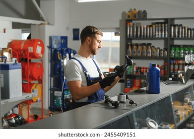 sales consultant in a car parts and accessories store. - Powered by Shutterstock