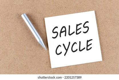 SALES CYCLE Text On A Sticky Note On A Cork Board With Pencil ,