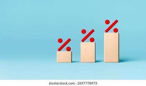 Sales discount, interest rate decline, investment reduce concept. Percentage sign with graph wooden cubes