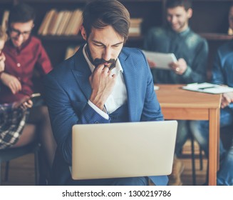 sales Manager with laptop on the background of business team in  - Shutterstock ID 1300219786