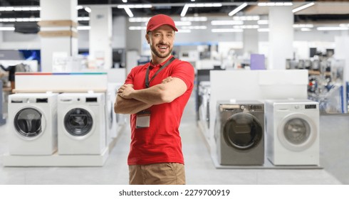 Sales manager posing inside an electrical appliance shop with washing machines