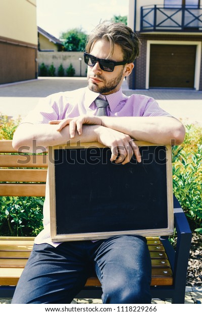 Salesman Sits On Bench Advertise Sale Stock Photo Edit Now