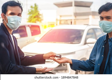 Salesman Wear Mask  Giving Key Car To Customer Concept Business Finance Insurance Coronavirus Covid19 