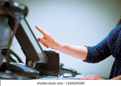 Saleswoman Doing Process Payment On Touchscreen Pos, Counting Sale