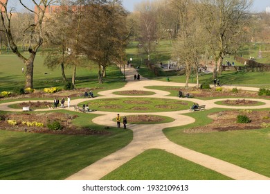 Salford, Greater Manchester, UK March 6, 2021. Peel Park With People Walking During The National Lockdown In England.