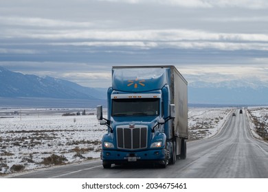 Salida, Colorado. USA. February 19, 2019. Snowy conditions can affect transportation. Walmart uses semi tractor trucks to deliver product across the USA.