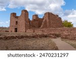 The Salinas Pueblo Missions National Monument preserves three Spanish missions in New Mexico, near Mountainair. Quarai or El Misión de Nuestra Señora de la Purisima Conceptión de Cuarac. Red sandstone