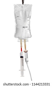 saline with syringe on white background