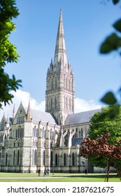 SALISBURY, ENGLAND - JUNE 25, 2021: View Of Salisbury Cathedral Church Of The Blessed Virgin Mary. Example Of Early English Gothic Architecture.