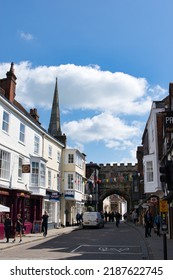 SALISBURY, ENGLAND - JUNE 25, 2021: View Of Salisbury Cathedral Church Of The Blessed Virgin Mary. Example Of Early English Gothic Architecture.