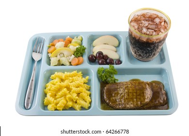 salisbury steak dinner with macaroni, vegetable medley, fruit, and beverage on blue cafeteria tray