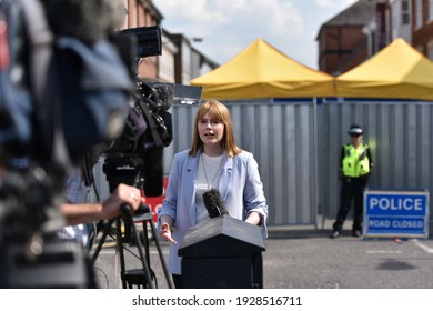 Salisbury, UK - July 6, 2018: A News Reporter Broadcasts Live On TV As Police Cordon Off A Hostel As Investigations Continue After Local Residents Fall Ill With Nerve Agent Poisoning.