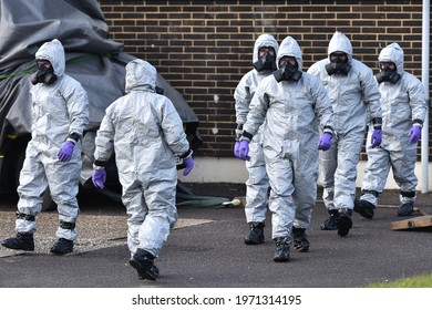 Salisbury, UK - March 8, 2018: Army And Police In Hazmat Suits Take Part In An Investigation And Clean-up Operation After The Nerve Agent Poisoning Of Former Russian Spy Sergei Skripal.