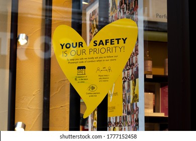 Salisbury, Wiltshire, England - July 6, 2020, COVID 19 Health And Safety Social Distancing Information Sign For Shoppers In Retail Store Window