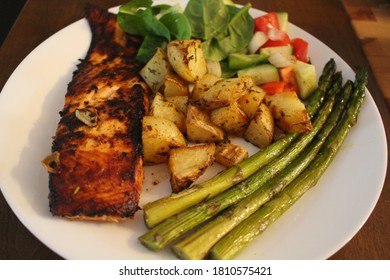 Salmon With Asparagus, Roasted Potatoes, And Salad