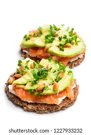 Salmon  And Avocado Rye Bread Sandwich Isolated On White 