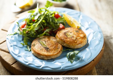 Salmon Cakes With Vegetables And Arugula Salad