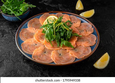 Salmon Carpaccio With Parmesan, Balsamic Sauce And Arugula